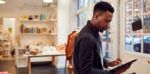 man working in a retail store