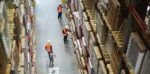works in a warehouse moving inventory